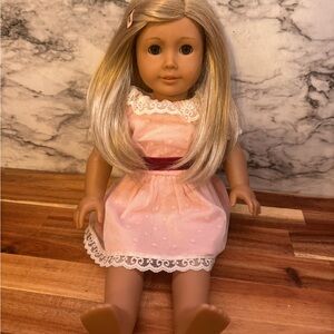 American Girl Doll with Blonde Hair and Pink Dress